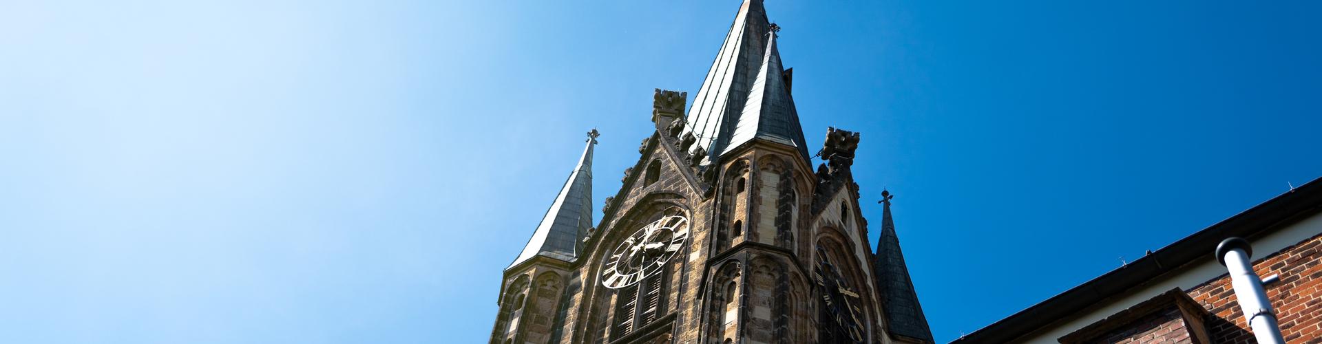 Kirchturm mit Uhr in Sendenhorst Kirchturm mit Uhr in Sendenhorst